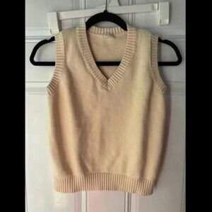 John Galt cream colored sweater vest. No size but fits like a S/M